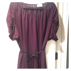 Top with leather tie belt